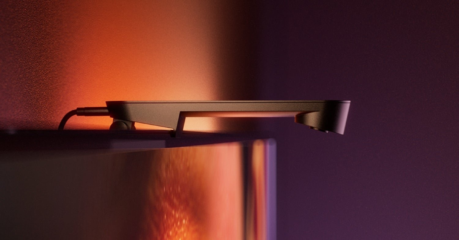 La caméra Play Screen Sync se fixe sur le cadre du téléviseur et analyse l’image affichée afin d’en reproduire les couleurs sur les éclairages Hue. ©Philips