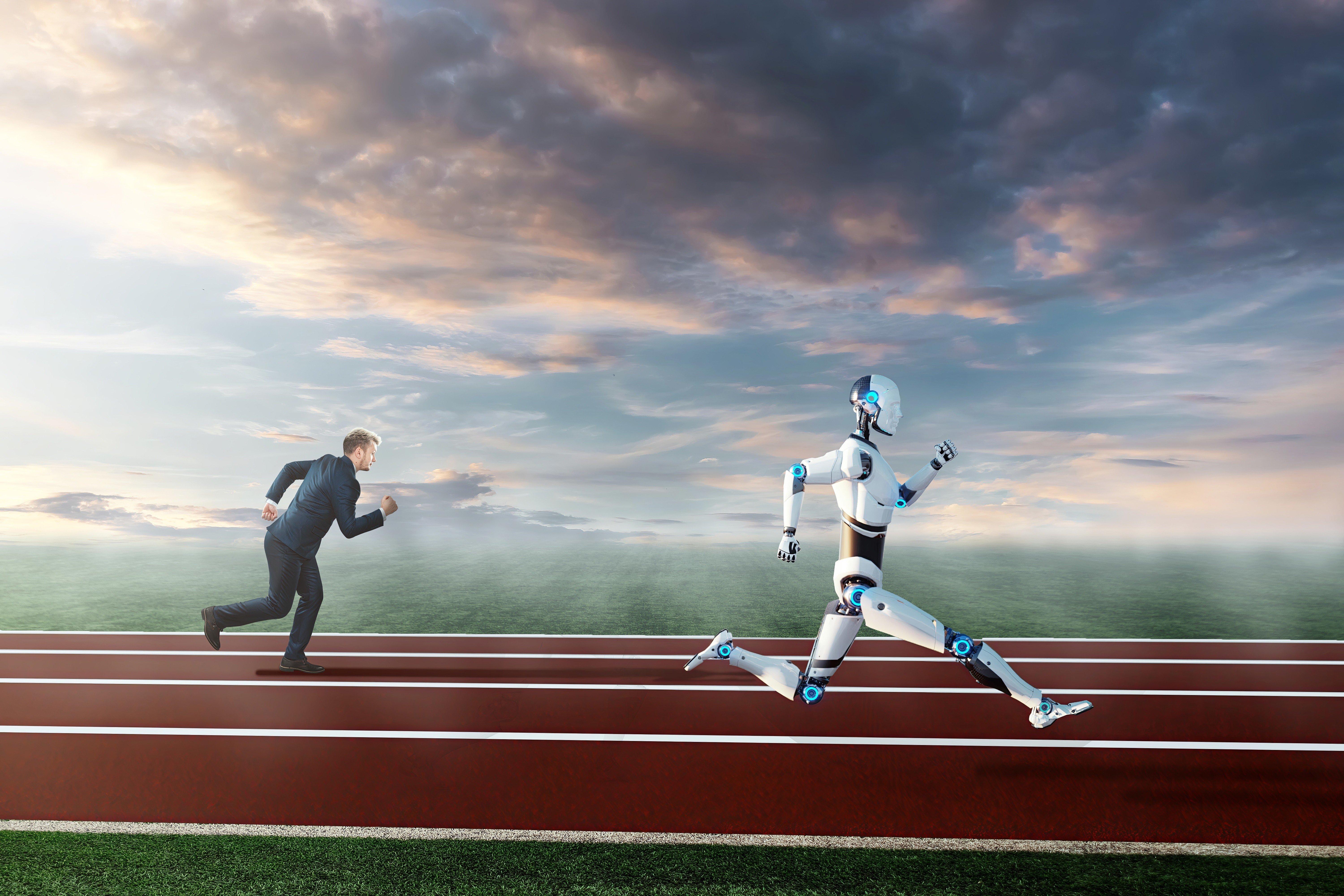 Un homme et un robot font la course © Shutterstock