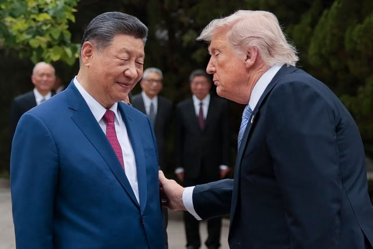 Donald Trump/Xi Jinping - © EVAN VUCCI/AFP