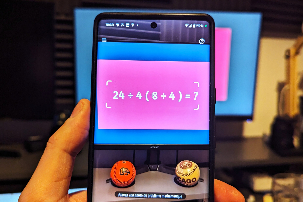 Utilisation de l'appareil photo d'un smartphone pour scanner une équation mathématique avec Photomath.