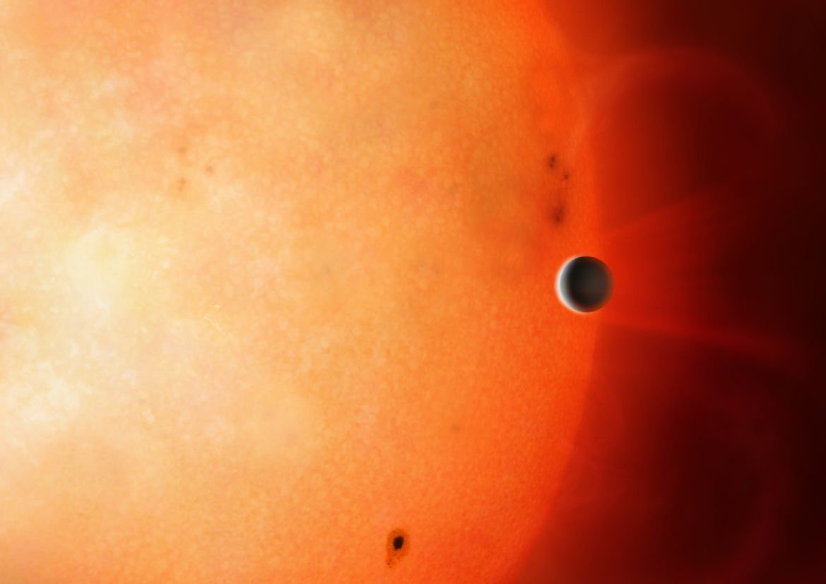 Une vue d'artiste d'une planète de la taille de Neptune orbitant à proximité de son étoile hôte © University of Warwick/Mark Garlick 