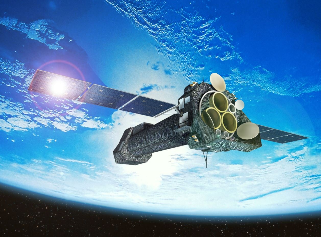 Vue d'artiste du télescope XMM-Newton lors d'un passage près de la Terre. Crédits ESA - D. Ducros