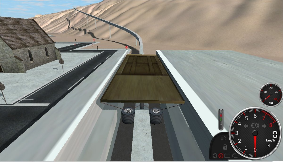 Exemple de situation : une plateforme progresse sur une route désertique, illustrant la variété d'engins pilotables dans le jeu - © Rigs of Rods