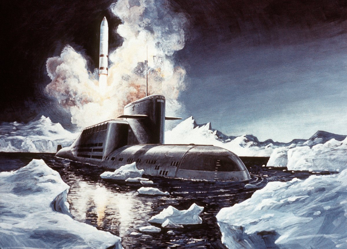 Vue d'artiste d'un sous-marin de classe Delta en plein déclenchement (ou riposte) de guerre nucléaire. Oui, mais si c'était un satellite, en fait, sous la coiffe ? Crédits Russian MOD