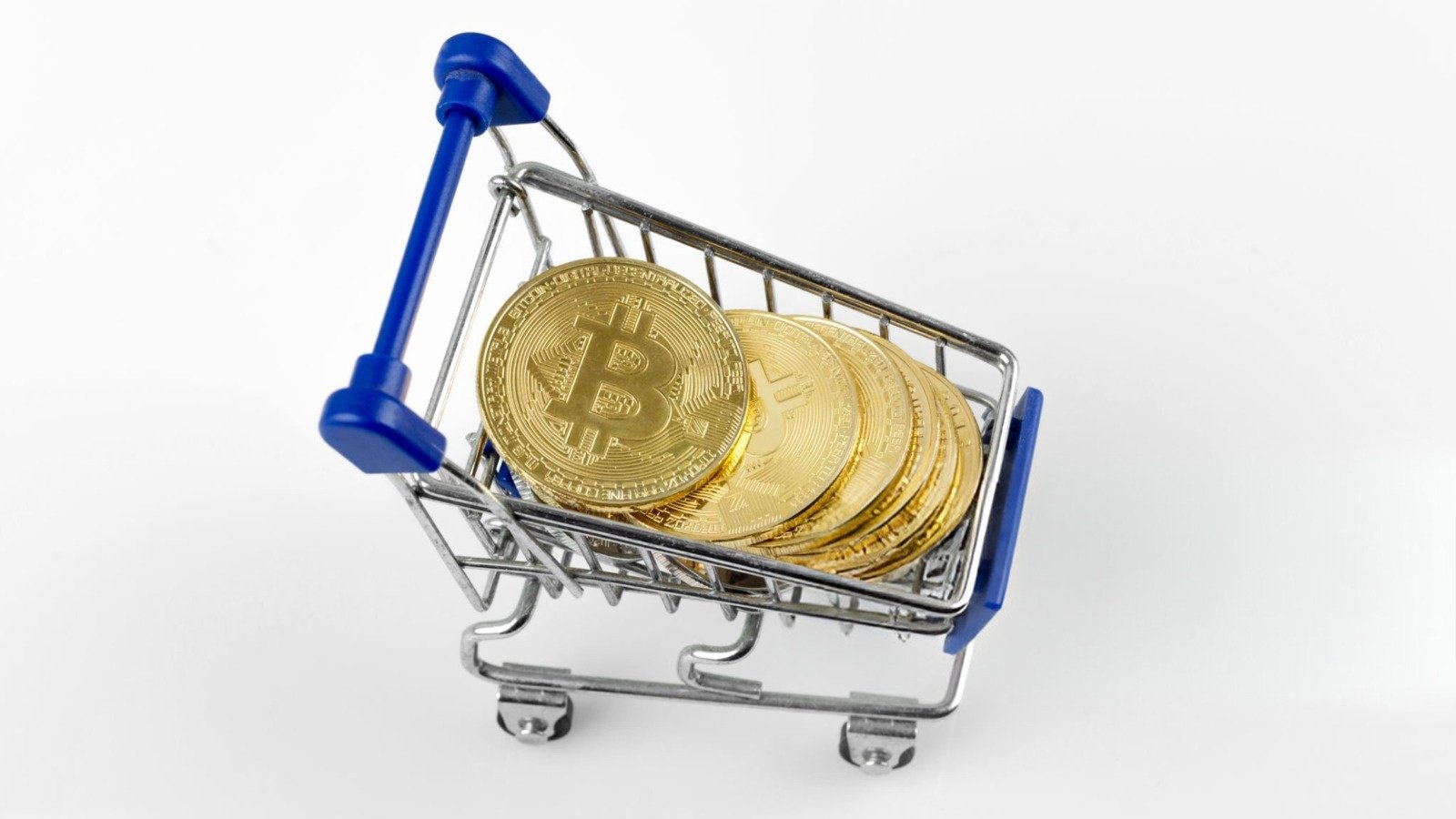 À la caisse d'un magasin partenaire, vous choisissez une carte cadeau Bitcoin Starter Kit, pour un montant compris entre 25 et 500 euros. Vous repartez avec un code d'activation et une carte en PVC, qui dissimule une clé privée sous une pastille à gratter - ©Bymuratdeniz / Shutterstock