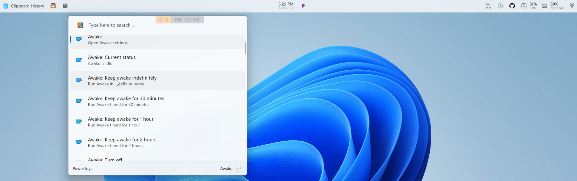 Le dock peut être épinglé en haut du Bureau Windows et centralise indicateurs système et extensions PowerToys. © Microsoft
