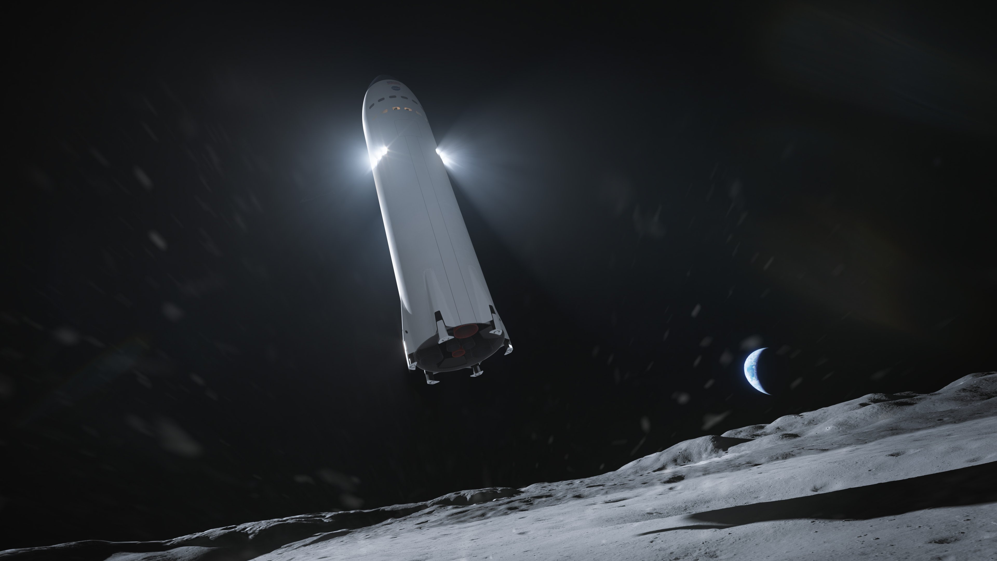 Vue d'artiste du Starship en train de se poser sur la Lune. ©SpaceX