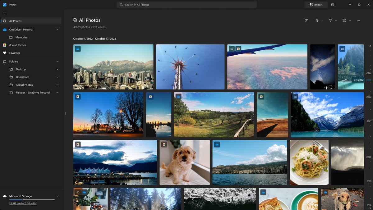 Galerie de Microsoft Photos affichant une organisation visuelle par date et dossiers synchronisés via OneDrive. - © Microsoft Photos