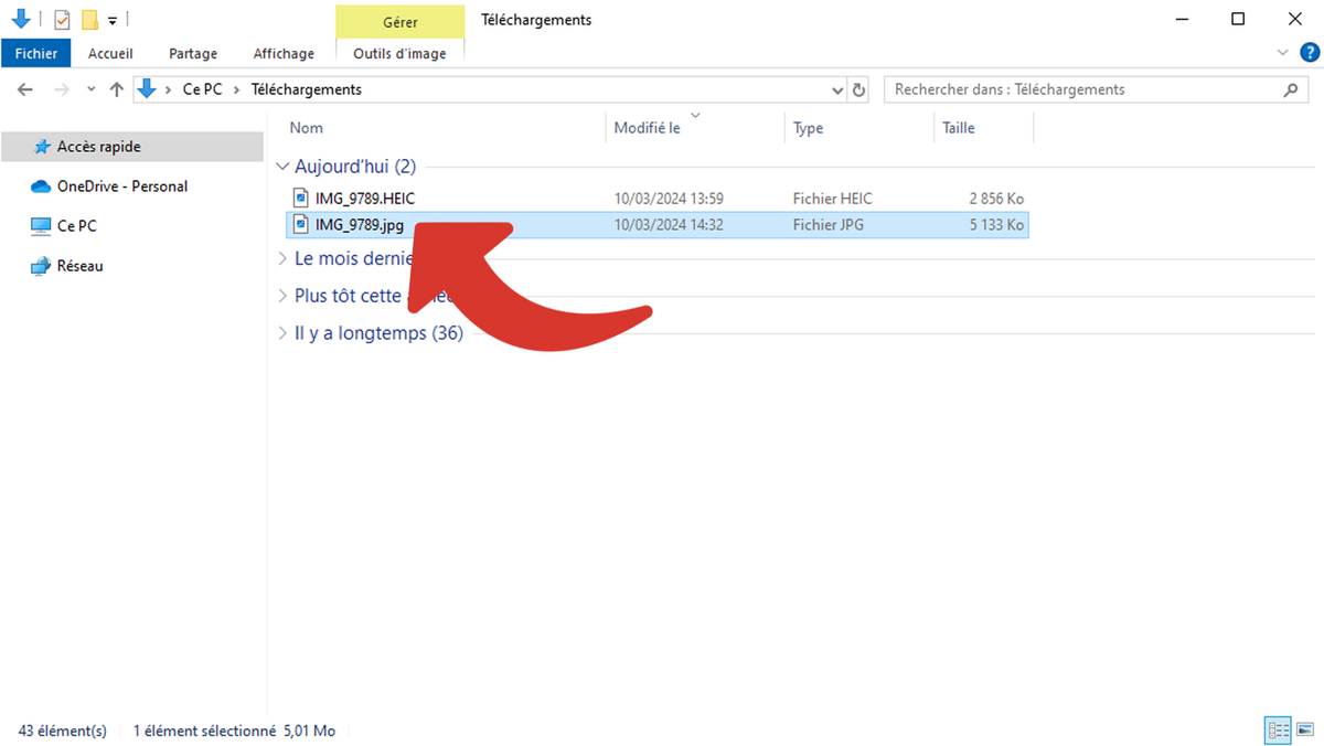 Dossier Téléchargements avec le fichier photo HEIC converti JPG © Clubic