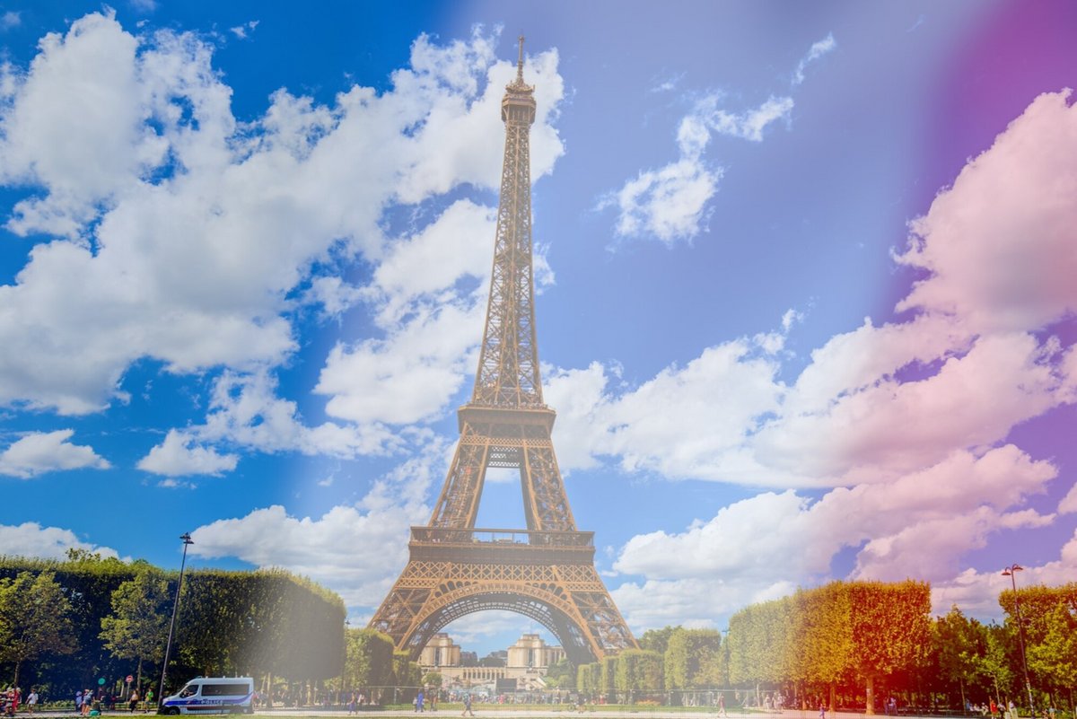 La tour Eiffel, avec le drapeau français en filtre sur l'image © Iurii Dzivinskyi x Nataliia K x Shutterstock.com x Clubic