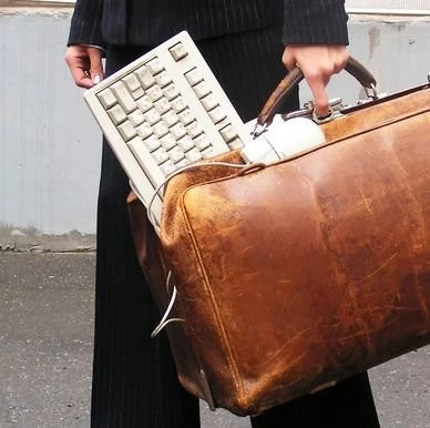 0320000008486778-photo-teletravail-ordinateur-nomade.jpg