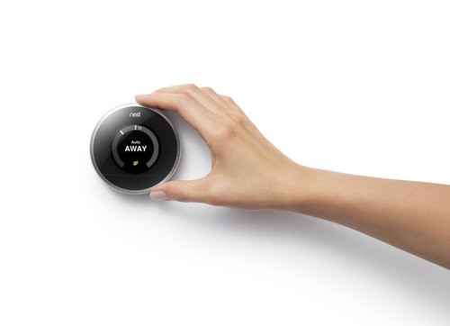 01F4000007583313-photo-nest-thermostat-with-hand.jpg