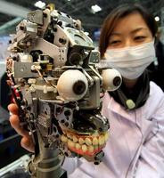 000000C803041178-photo-live-japon-robot-cobaye-dentiste.jpg