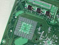 00C8000000049490-photo-epox-8kha-des-transistors-au-dos-de-la-carte.jpg