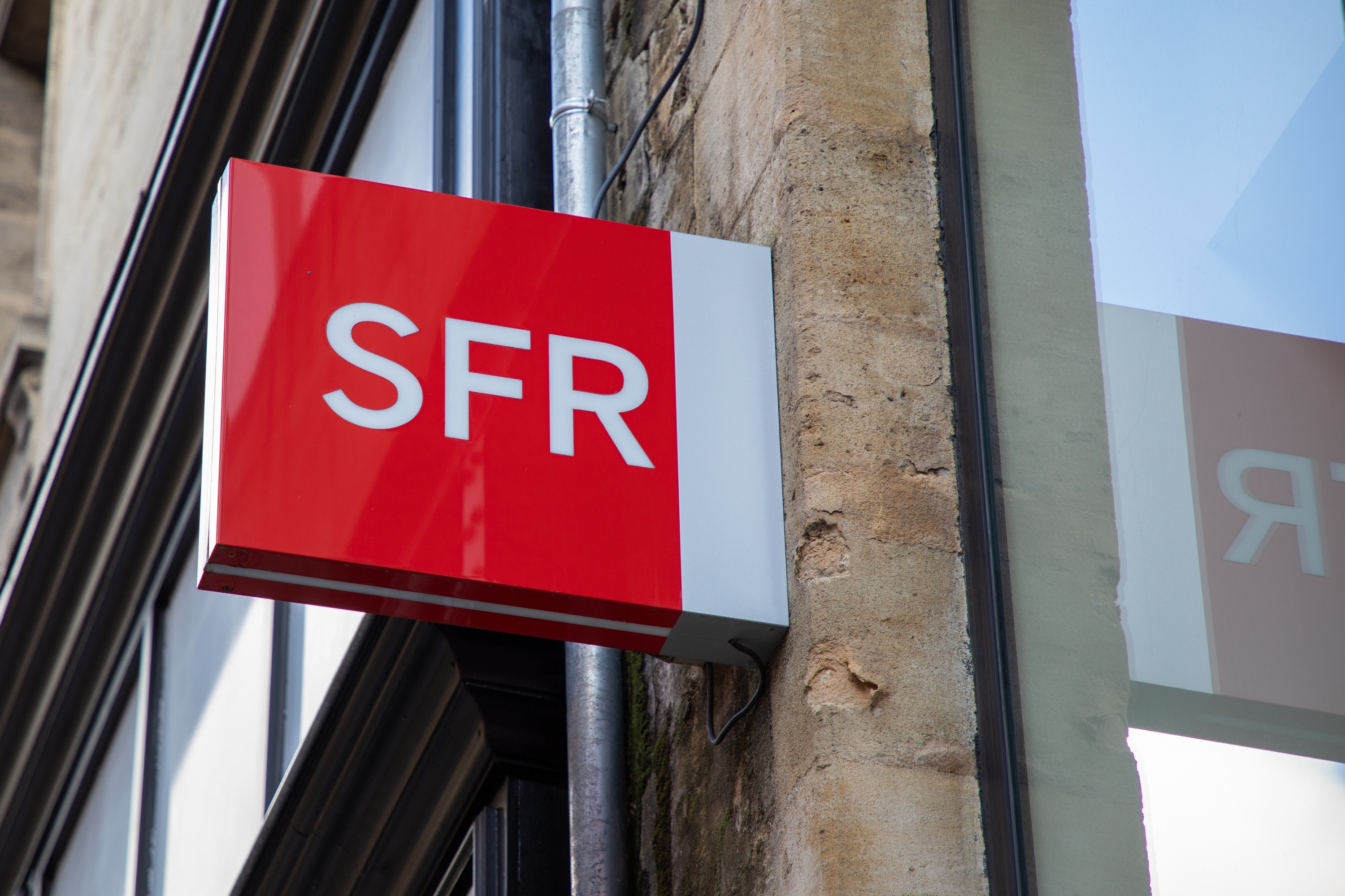 SFR : Patrick Drahi est-il prêt à perdre le contrôle d'Altice pour éponger sa dette ? Ses créanciers l'y pousseraient